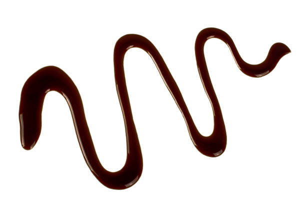 istock Chocolate sauce isolated on a white background 925047926