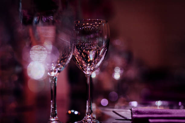 istock Luxury table settings for fine dining with and glassware, beautiful blurred  background. For events, weddings. 925050696