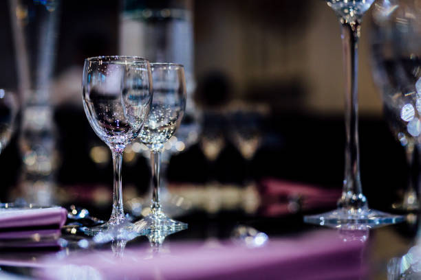 istock Luxury table settings for fine dining with and glassware, beautiful blurred  background. For events, weddings. 925050710