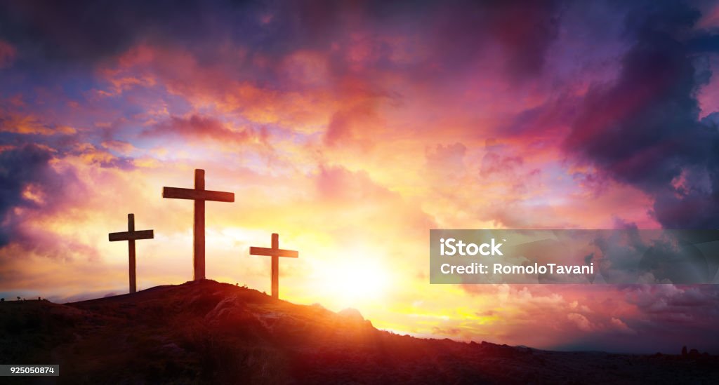 Crucifixion Of Jesus Christ  At Sunrise - Three Crosses On Hill Three Crosses On Mountain With Red Clouds Religious Cross Stock Photo