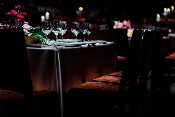 istock Luxury table settings for fine dining with and glassware, beautiful blurred  background. For events, weddings. 925051214
