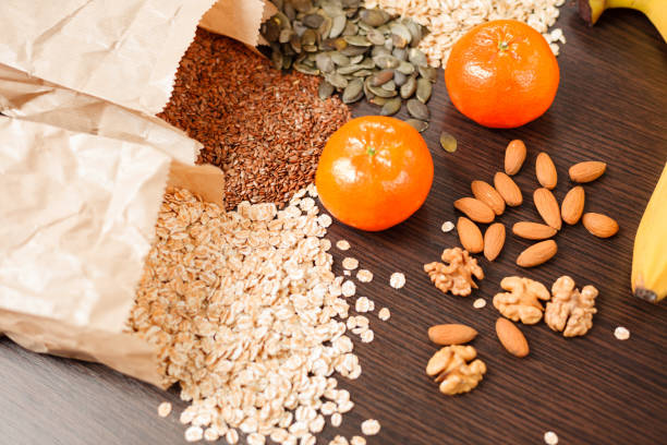Top view of various wholegrain seeds and other healthy foods
