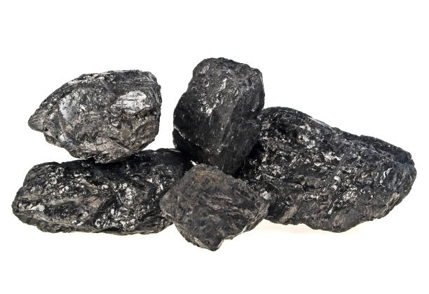 istock Pile of coal isolated on a white background 925052284