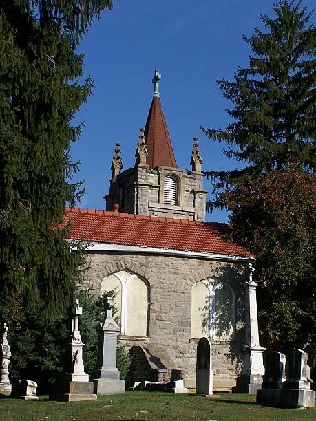 istock church in cemetery 92505360