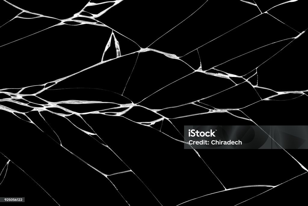 Art of wrinkles and cracks of mirror Art of wrinkles and cracks of mirror caused by smashing and falling bumps. isolated on black background, This crack can be used as a pattern of floor tiles, in one corner also means loss and discord Mirror - Object Stock Photo