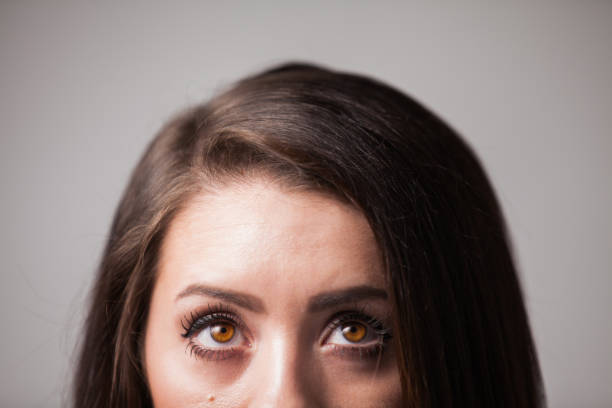 istock Woman Looks Up 925056338