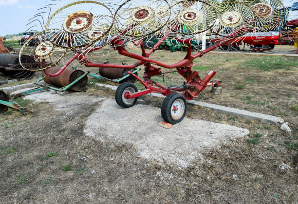 istock Tedder on trailer for tractor. The machine for gathering hay. 925059222