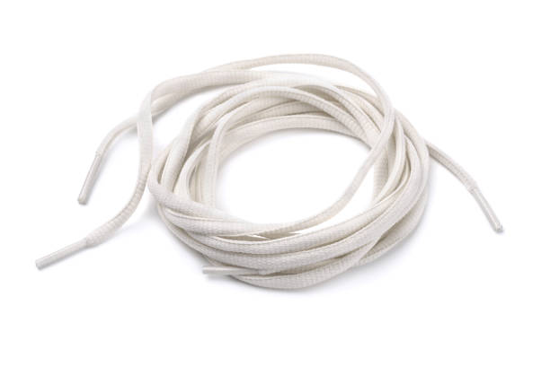 Shoelaces Rolled shoelaces isolated on white Ollie stock pictures, royalty-free photos & images