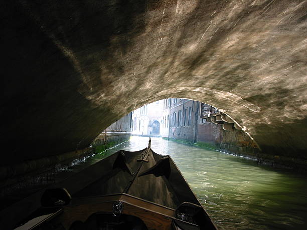 light at the end of a venice tunnel stock photo