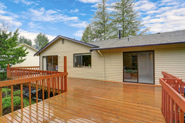 istock Backyard view of a spacious two story home with walk out deck 925066904