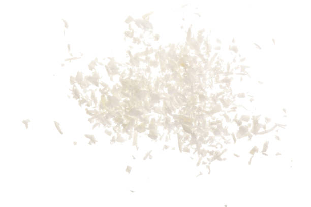 istock Heap of coconut flakes isolated on white background 925076304