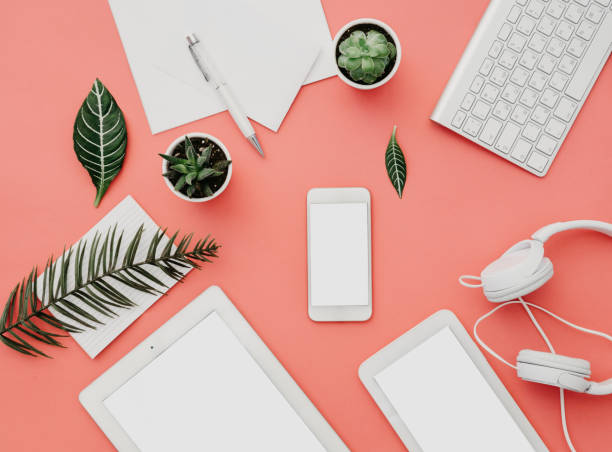 istock Mockup of smartphone with white screen on pastel background. Flat lay, top view workspace 925080074