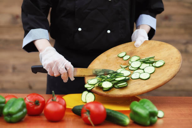 istock The cook cuts fresh farm vegetables 925085238