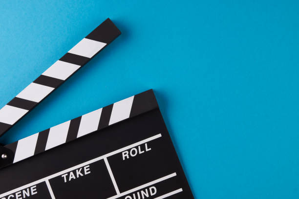istock Movie clapper board on blue background 925087704