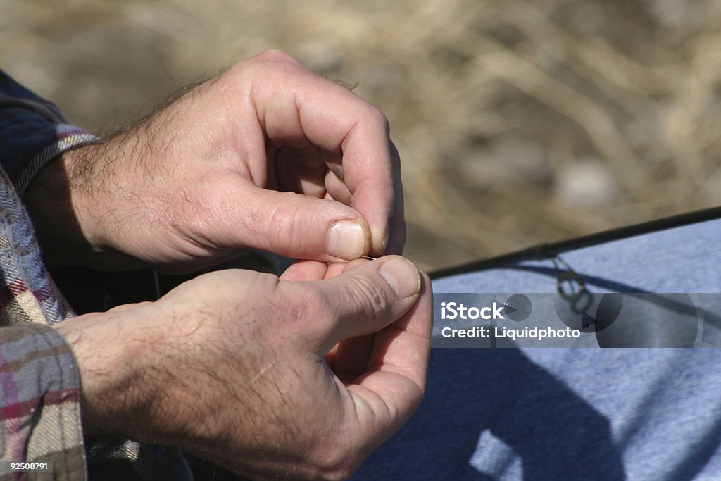 Maschile mani pesca - Foto stock royalty-free di Abbigliamento casual