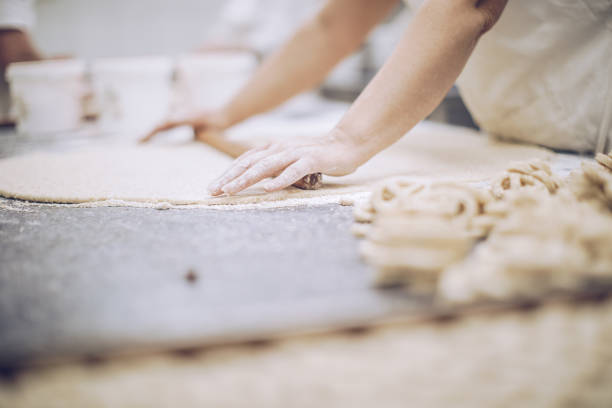istock Woman making pretzels 925088552