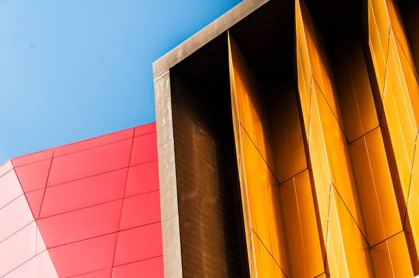 istock Blue sky red and yellow wall abstract background 925093038