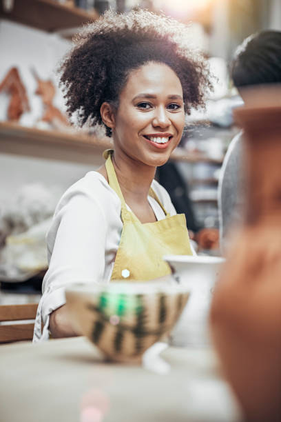 istock Close-Up Of Woman Potter Working At Table 925093344