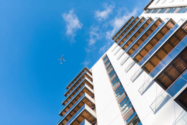 istock Lifestyle Apartments and Plane on the Sky 925096824