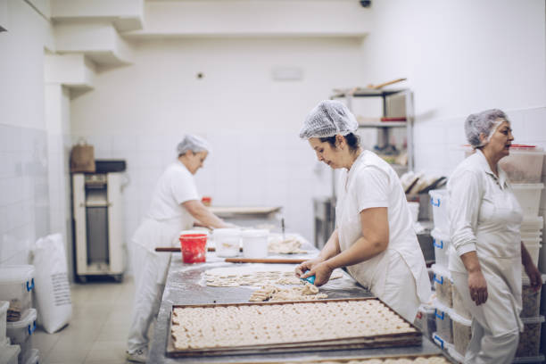 istock Women in bakery making food 925096904