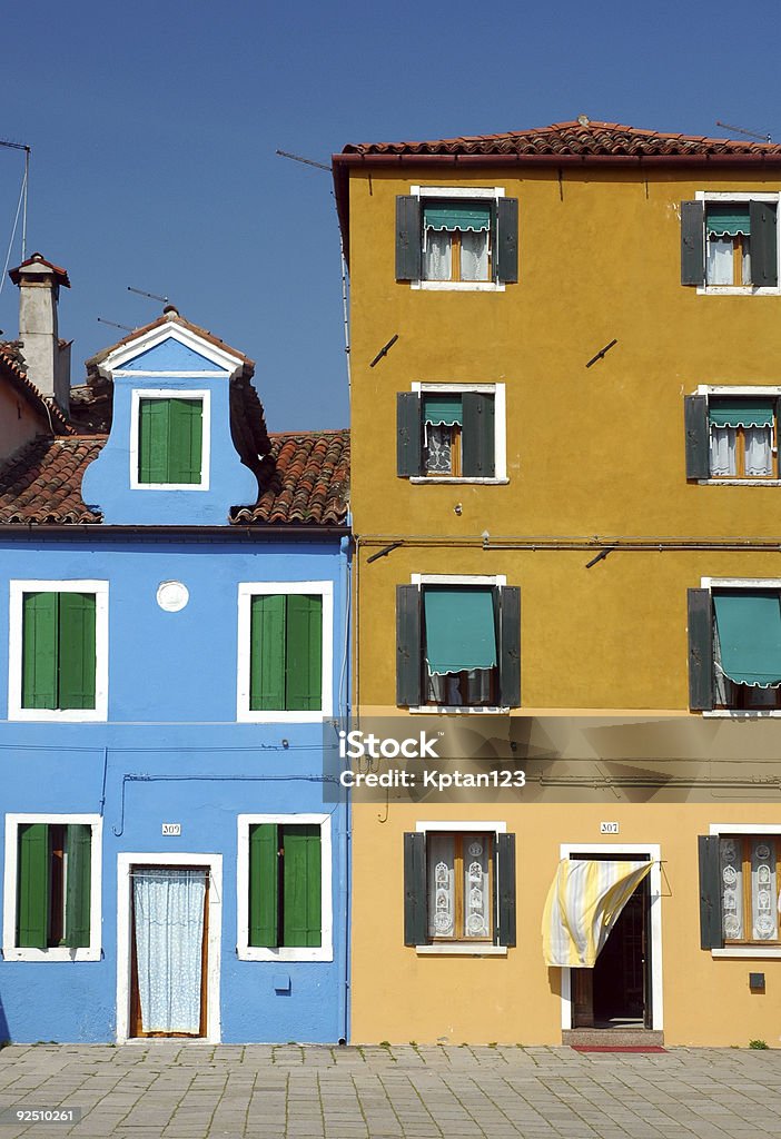 Colorful street of Burano  Blue Stock Photo