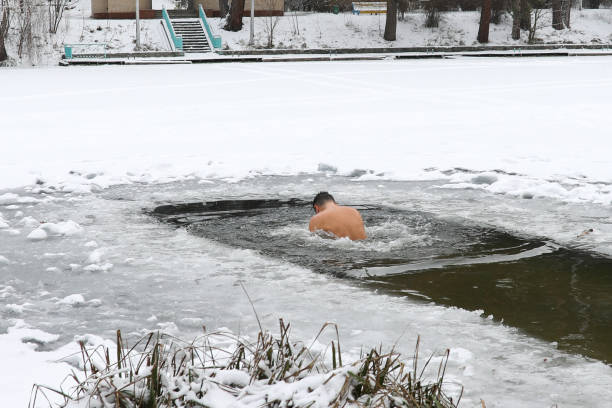 istock Bathing in the ice-hole in  Epiphany Day. 925104062