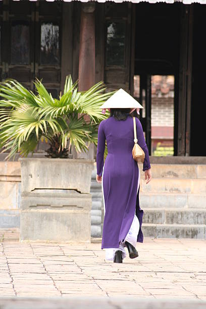 istock traditional vietnamese lady with typical hat 92510423