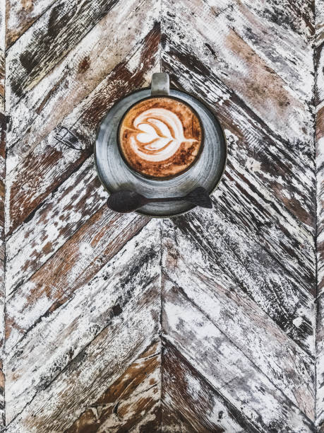 istock Cup of coffee with beautiful tableware on wooden shabby rustic textured background. Empty place for sign, text, logo. 925104376