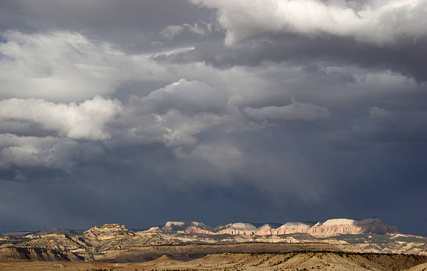 istock Sunlit Mountains Against Stormy Sky 92510487