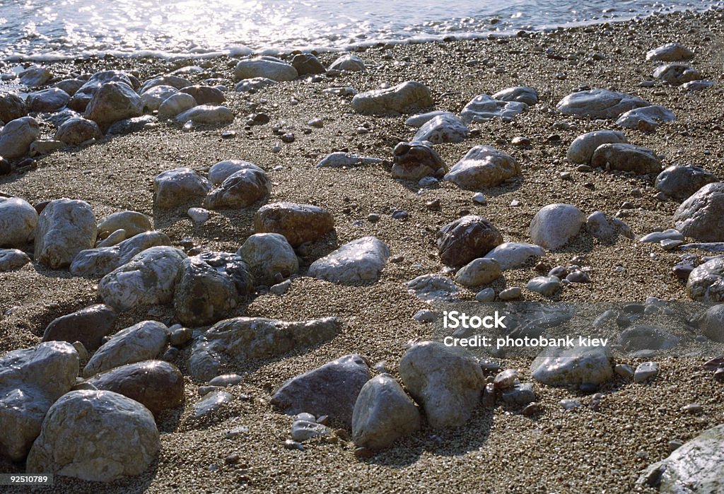 Guijarros en la playa - Foto de stock de Agua libre de derechos