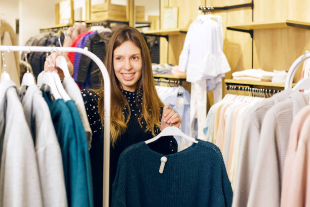 istock Girl working as a store assistant. 925107950