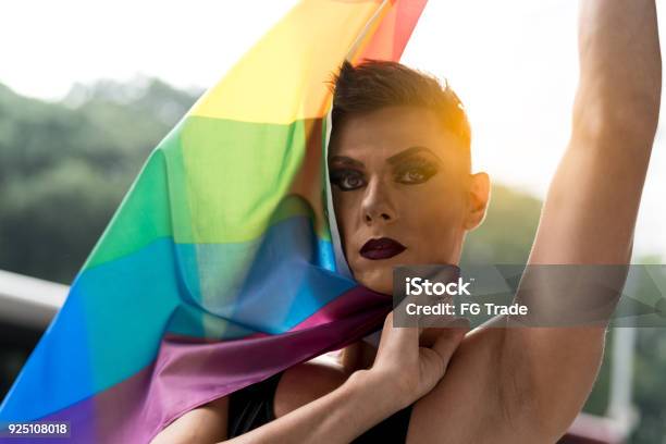 Confident Gay Boy Holding Rainbow Flag Stock Photo - Download Image Now - Drag Queen, Men, Make-Up