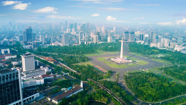 Beautiful National Monument with city skyline JAKARTA, Indonesia. February 22, 2018: Beautiful scenery of National Monument with city skyline jakarta skyline stock pictures, royalty-free photos & images