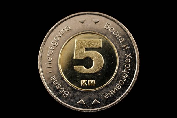istock Bosnian 5 KM Coin Isolated On A Black Background 925111718