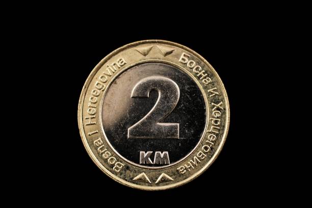 istock Bosnian 2 KM Coin Isolated On A Black Background 925111720