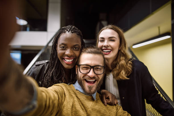 istock Students taking a photo of themselves 925111786