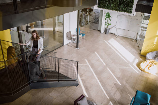 istock Business People sitting on staircase after finishing their work 925118046