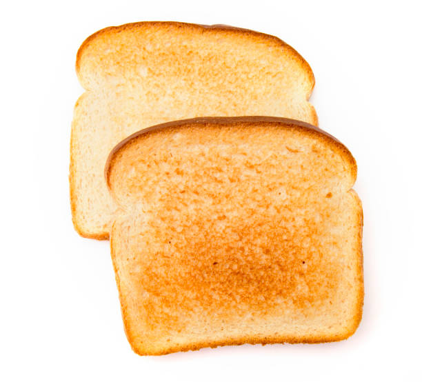 istock Slighty Golden Toast on a White Background 925122374
