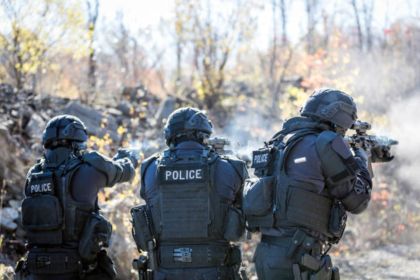 istock Swat Police Officers Shooting With Firearm 925123686