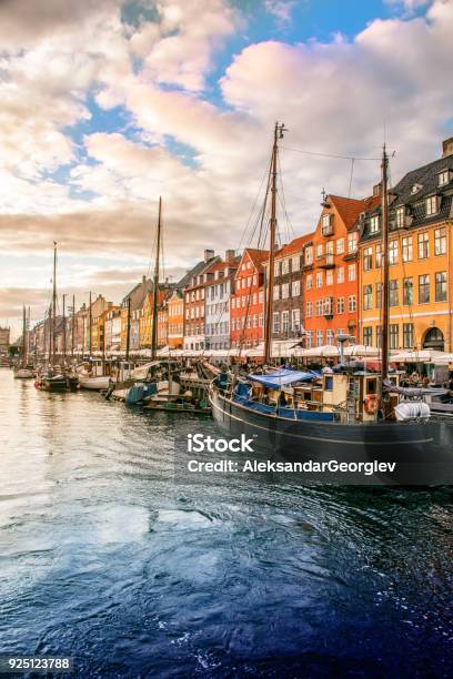 Colorful Traditional Houses In Copenhagen Old Town Nyhavn At Sunset Stock Photo - Download Image Now
