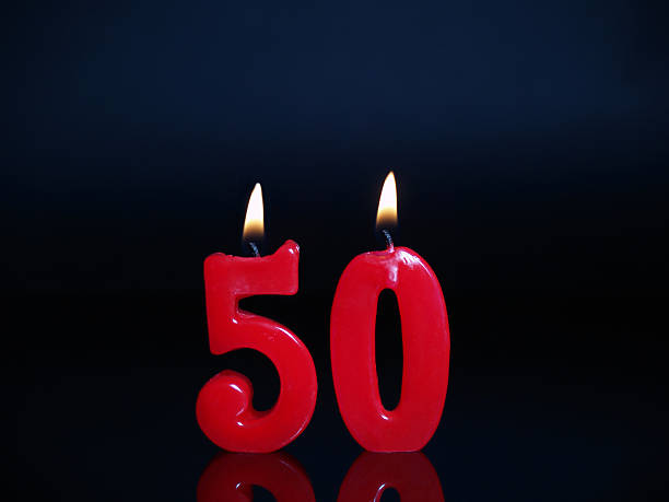 Set of 50th anniversary or birthday red candles stock photo