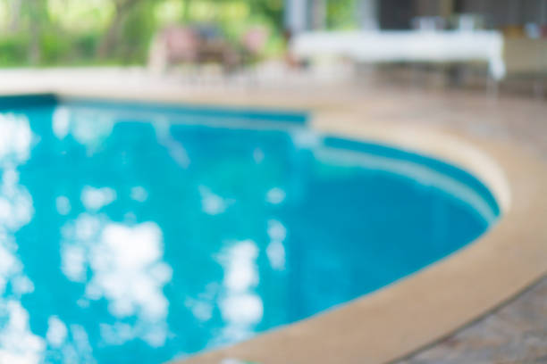 istock blurry background of swimming pool view 925126812