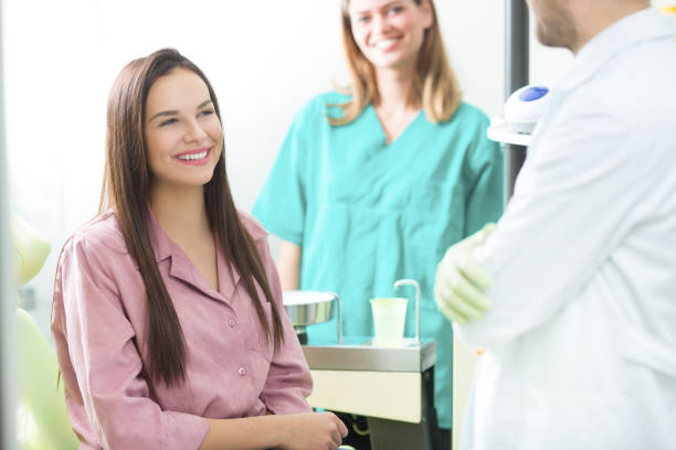 istock Beautiful young woman at dentist 925127206