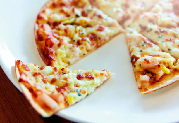 istock Tortilla Pizza with mozzarella cheese, imitation crab stick, sweet corn and pineapple. 925134970