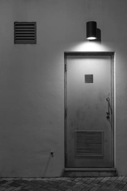 istock Light, air vent and door on wall 925135212