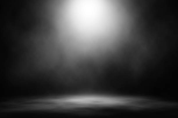 istock White spotlight smoke stage nightclub entertainment background. 925145056
