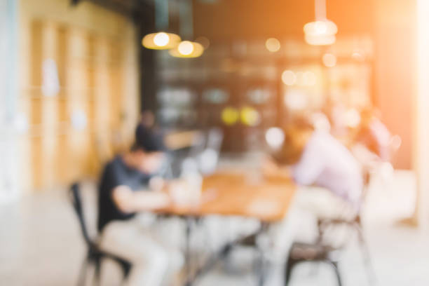 istock blur image background of office or co working space with people 925145240