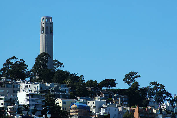 Daytime view of the Coit tower and the Telegraph hill neighborhood of San Francisco (California).