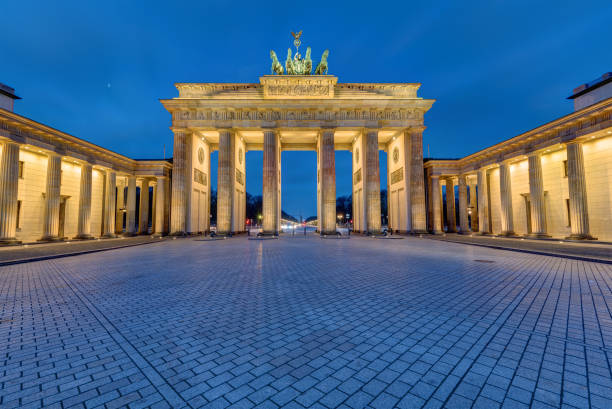 istock The famous illuminated Brandenburg Gate in Berlin 925147578