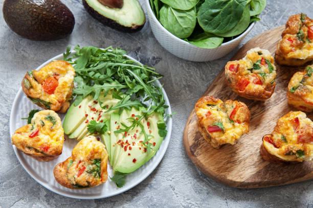 istock Delicious egg muffins with ham, cheese and vegetables 925151700
